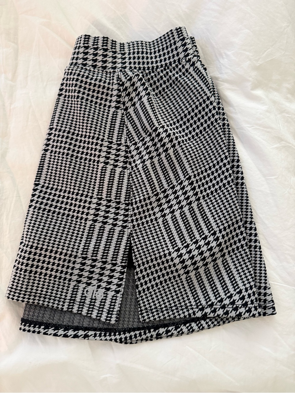 Alo glenplaid check tennis skirt.
